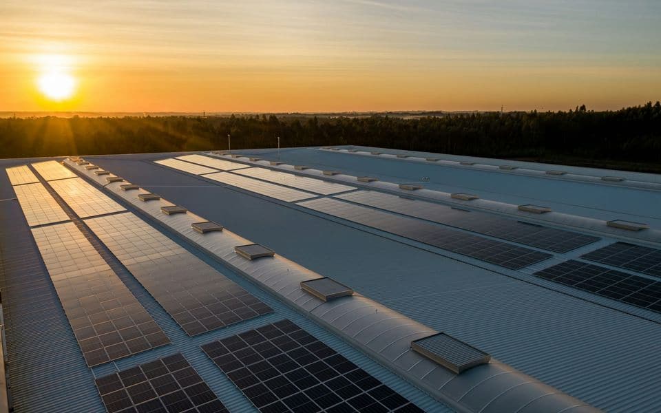 Rooftop photovoltaic solar panel array installed on a building