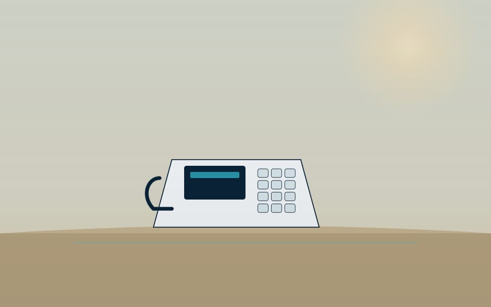 Teléfono IP de sobremesa en una recepción, de día